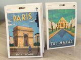 two books on a table with a picture of the taj mahal and a picture of the taj mahal