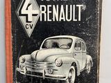 un vieux livre sur lequel figure l'image d'une vieille voiture