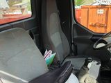 a car with a bunch of items in the back of it
