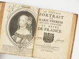 un vieux livre avec l'image d'une femme