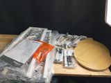 a wooden table with a lot of items on it