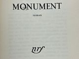 an open book with a black and white image on it