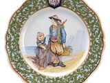 a plate with a picture of a man and a child on it