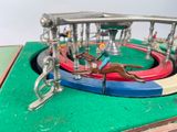 a toy carousel with a horse and rider on it