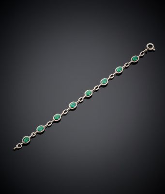 un bracelet d'émeraudes et de diamants