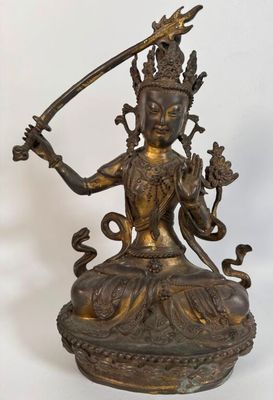 an image of a statue of a woman holding a sword