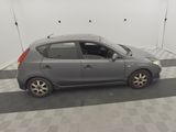 a picture of a small car parked in a garage