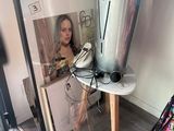 a picture of a woman sitting in a chair next to a trash can