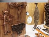 a display of wood carvings and other items on a table