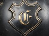 a close up of a helmet with a crest on it