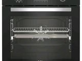 an image of a stainless steel oven with a rack in it