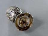 a silver object that is sitting on a table