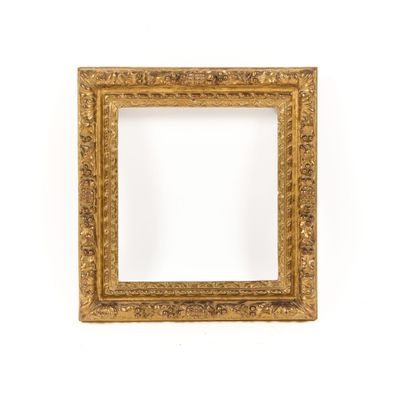 an old gold frame with a white background