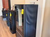 a lot of black appliances on display in a store