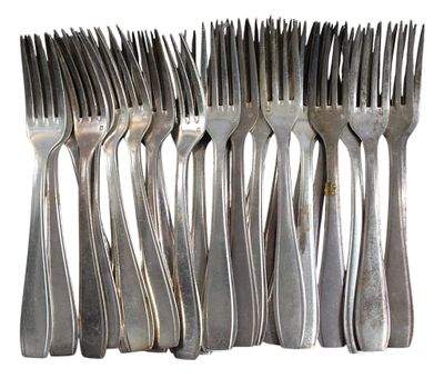 a lot of forks that are stacked together on a table