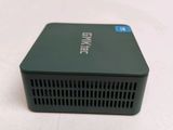 an image of a small green device sitting on top of a table