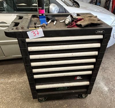 an image of a tool box with tools on top of it