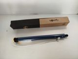 a pen that is sitting on a table next to a box
