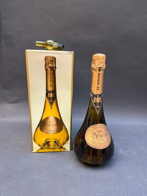 an image of a bottle of champagne next to a cardboard box