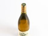 a bottle of wine that is sitting on a table