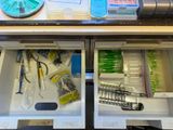a drawer that has many different items in it