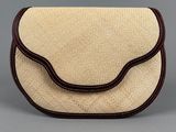 an image of a straw bag with a brown handle