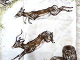 many animals that are running in the grass together