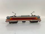 a toy train on a white surface with a white background