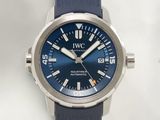 a watch with a blue dial on a blue strap