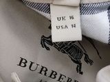 a close up of a shirt with a tag on it