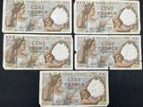 six french bank notes with a picture of a woman holding a baby