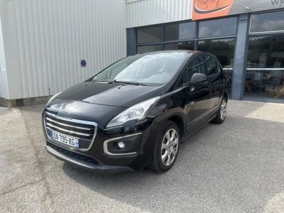 a black car parked in front of a building