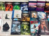 a lot of books that are sitting on a table