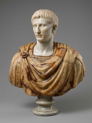 a marble bust of a man wearing a cloak