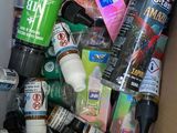 a box full of different types of paint and other items
