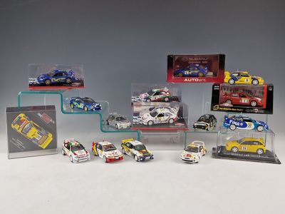 a group of toy cars are displayed in a display case