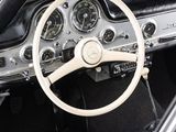 a dashboard and steering wheel of a classic car