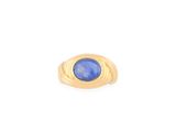 a close up of a gold ring with a blue stone