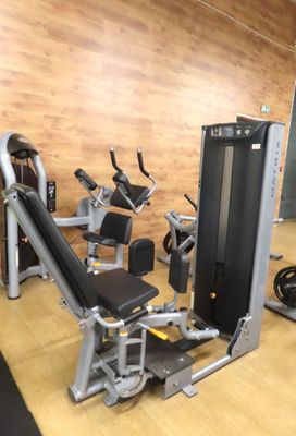 an image of a gym room with equipment in it