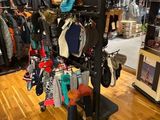 a display of clothing in a store with a ball in the foreground