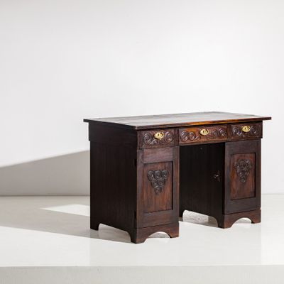 an image of a wooden desk with a marble top