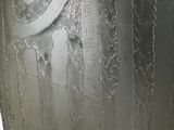 a close up of a glass vase with frost on it