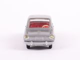a toy car that is sitting on a white surface