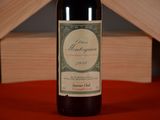 a bottle of wine that is sitting on a table