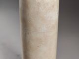 a vase that is sitting on a table in the room
