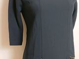 the back of a dress with a zipper on the side
