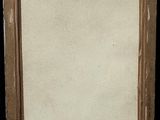 an old photo of a picture frame with a black background