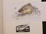 un livre sur lequel figure l'image d'un poisson