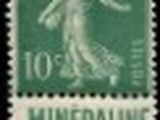 a green stamp with a picture of a man on it