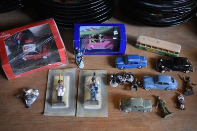 a lot of toys on a table with a picture on it